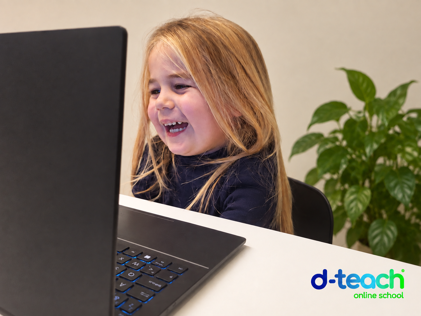 A pupil enjoying an online lesson at d-teach